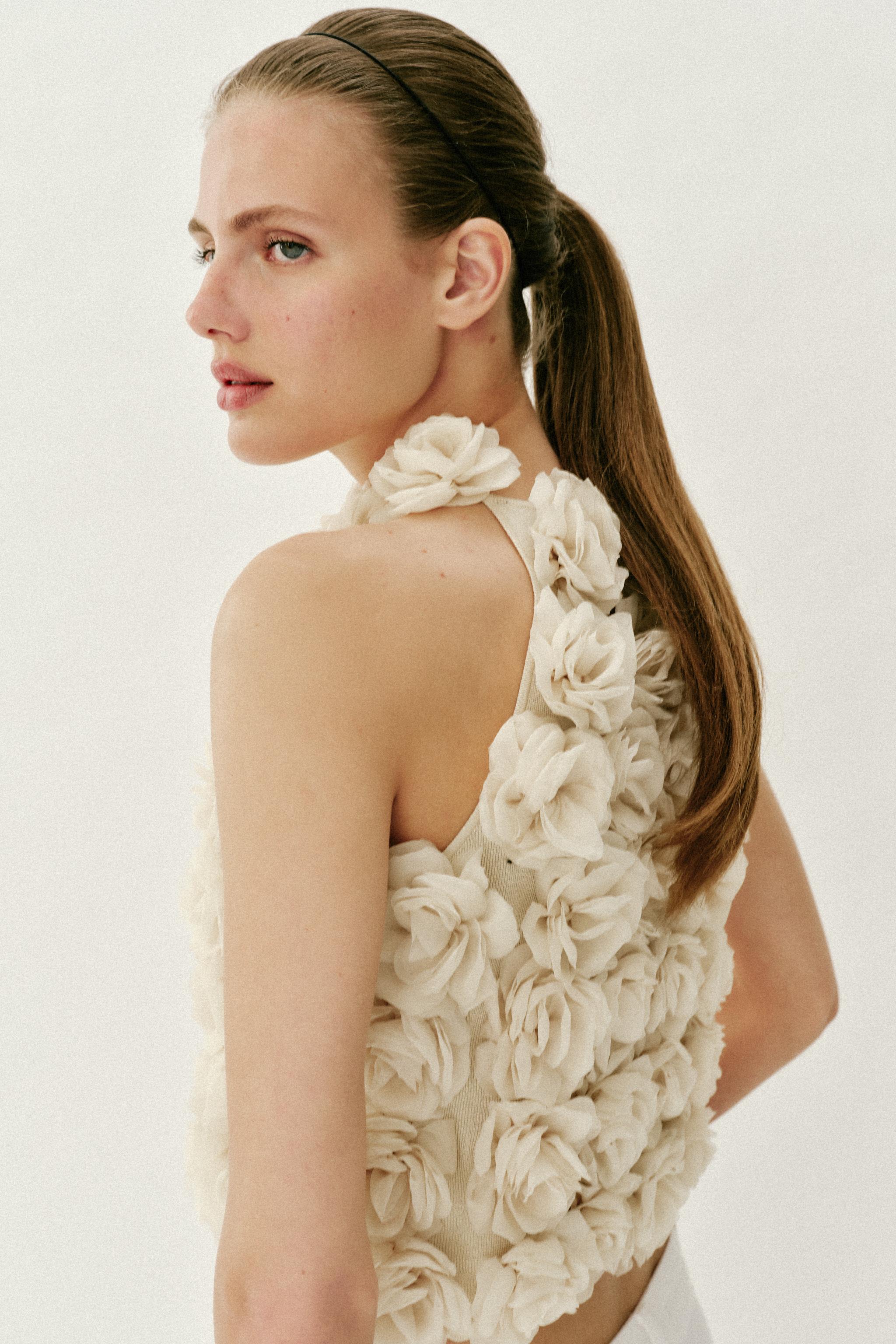 FLORAL TEXTURED KNIT HALTER TOP